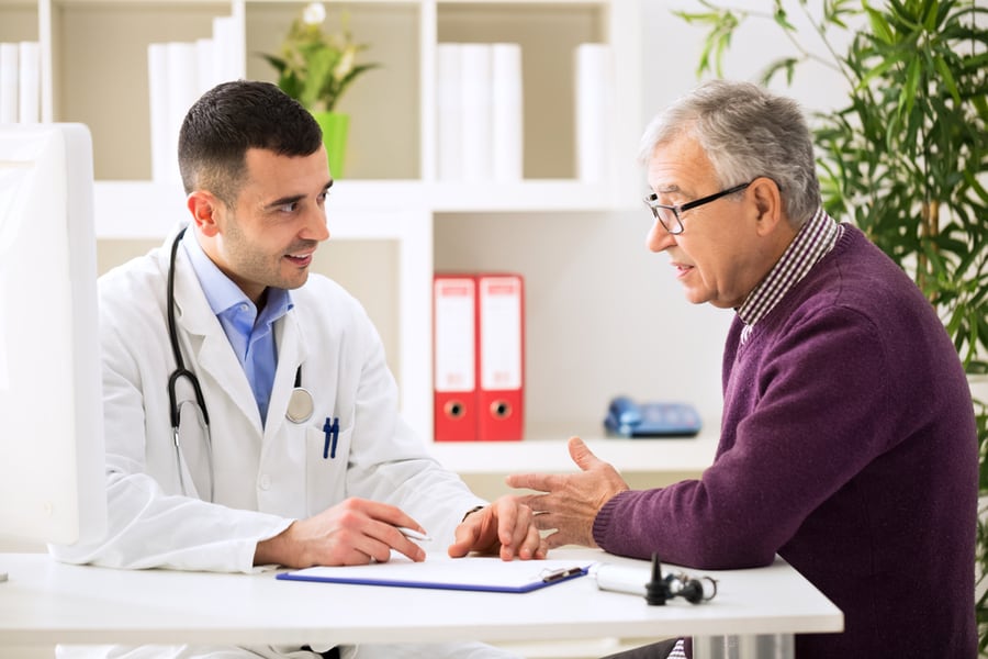 A Physician Discussing With A Patient