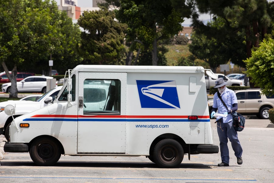 Usps Mail Truck And Postal Carrier