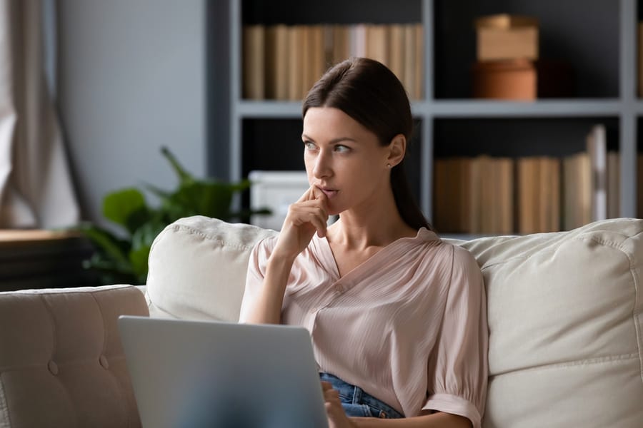 Woman Thinking About The On-Hold Status