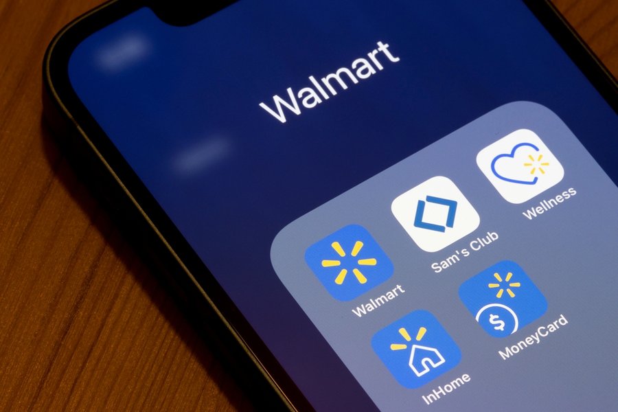 Assorted Walmart Inc.'s Mobile Apps Are Seen On An Iphone, Including Walmart Shopping And Grocery, Sam's Club, Walmart Wellness, Inhome Delivery, And Moneycard.