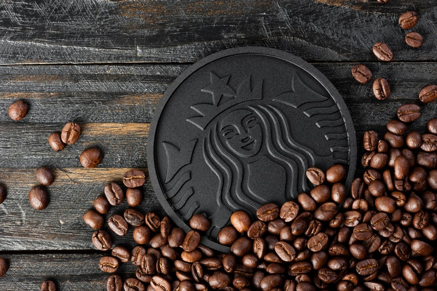 Closeup Black Starbucks Coaster Made From Recycled Starbucks Coffee Grounds.