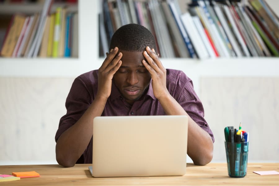 Frustrated Black Man Feeling Depressed After Account Suspension