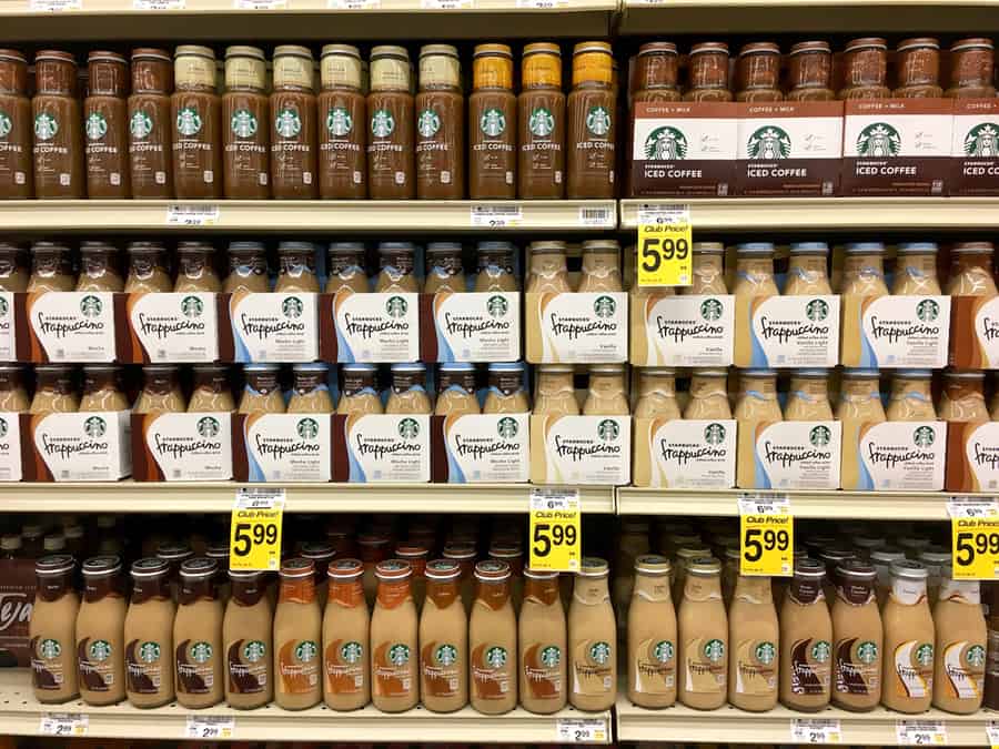 Grocery Store Shelf With Starbuck Brand Bottled Coffee.