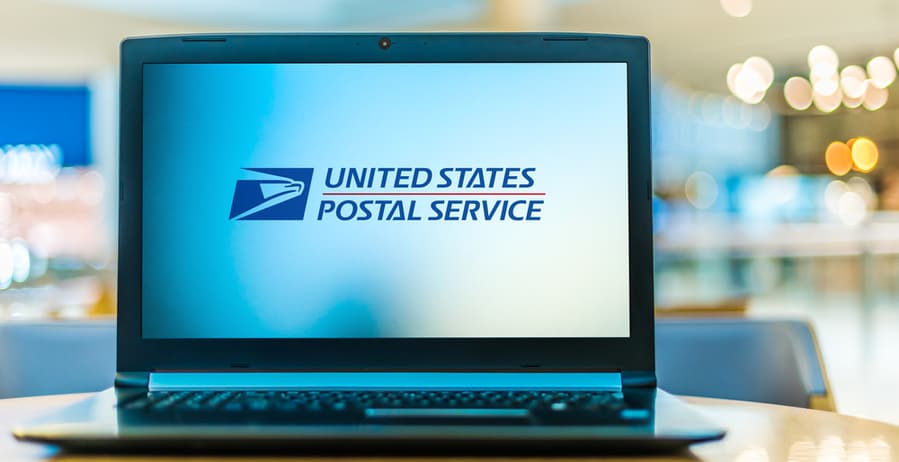 Laptop Displaying Logo Of The United States Postal Service