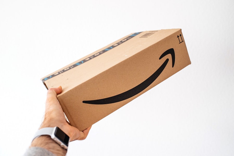 Man Holding Against White Background Amazon Prime Cardboard