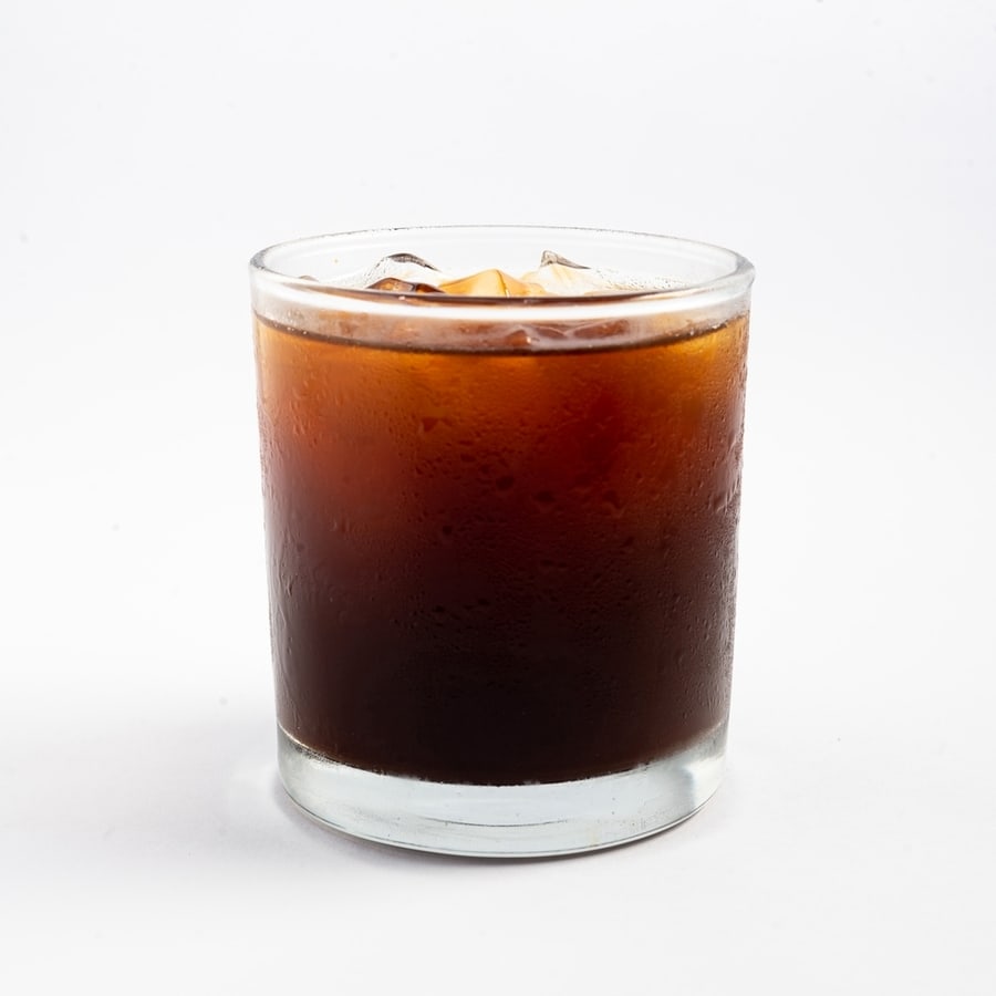 A Glass Filled With Iced Americano Coffee