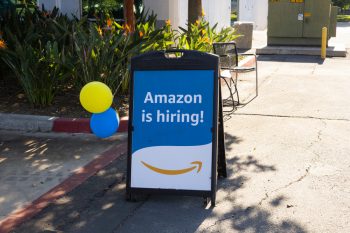 An A-Frame Sign Advertising That Amazon Corporation Is Hiring.