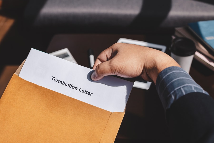 An Employee Receiving A Termination Letter