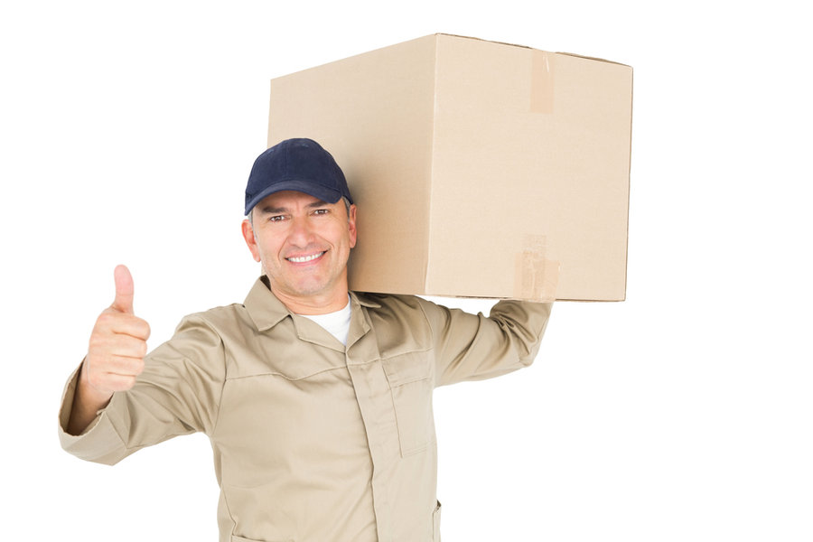 Delivery Man Carrying A Package And Showing A Thumbs Up On White Background