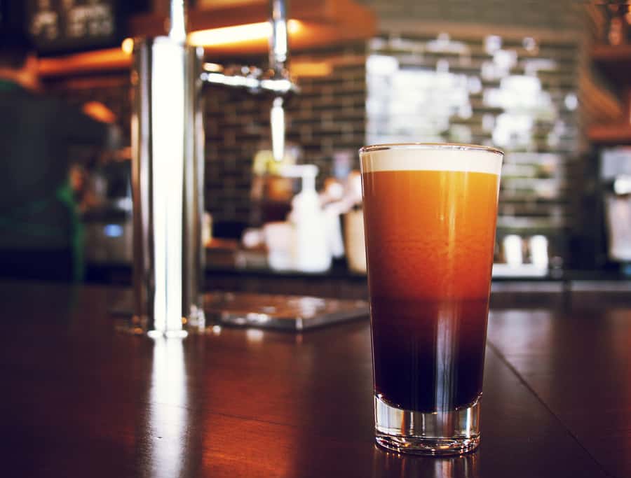 Frothy Sparkling Nitro Cold Brew Ready To Be Served At Coffee Shop Bar Environment
