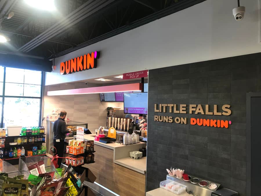 Making A Break To Eat Something At A Dunkin Donuat