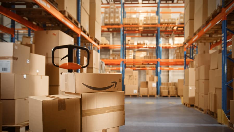 Packages With Amazon Logo In Warehouse