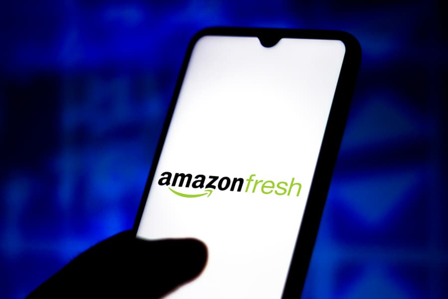 Photo Illustration Of The Amazon Fresh Logo Displayed On A Smartphone