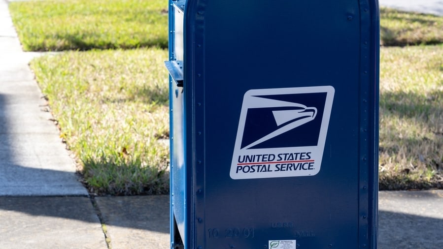 Photo Of A Usps Mail Box On The Side Walk