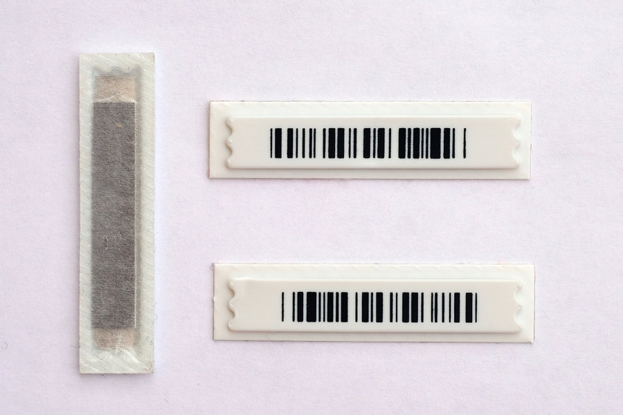 Sticker Magnetic Barcode Top View. Label For Acoustic Systems On A White Background. Anti-Theft Barcode Sticker.