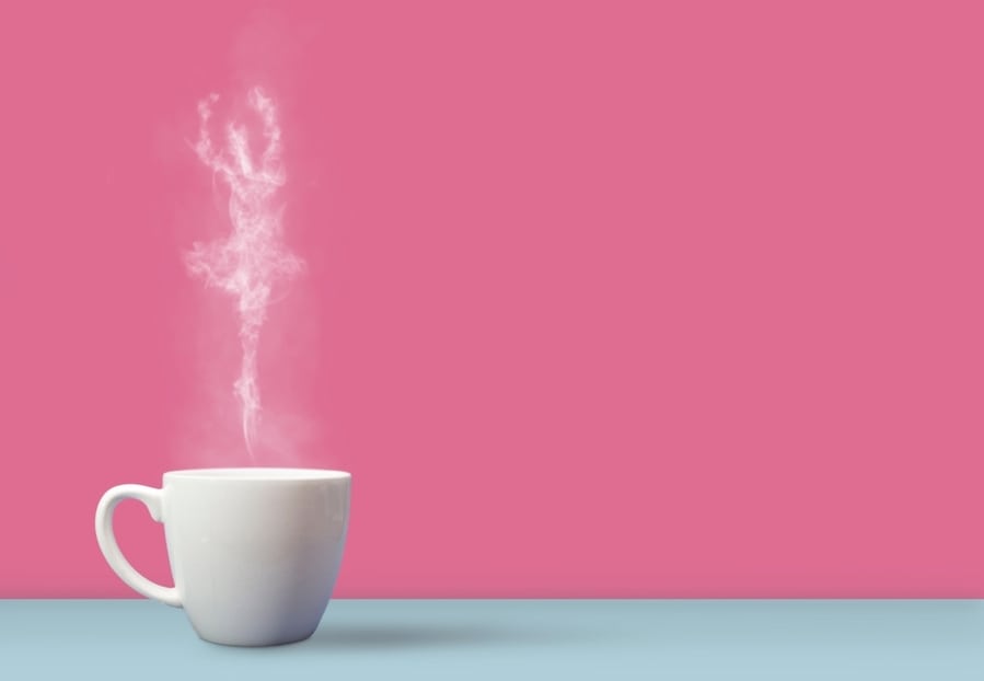 White Cup On A Pink Background With Smoke And Steam In The Shape Of A Ballerina