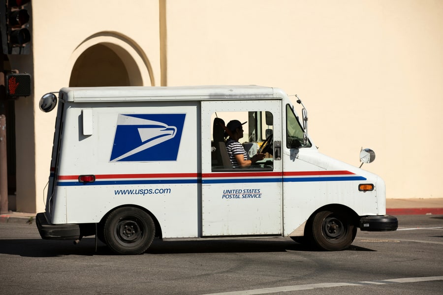 A United States Parcel Service Mail Truck Leaves For A Delivery