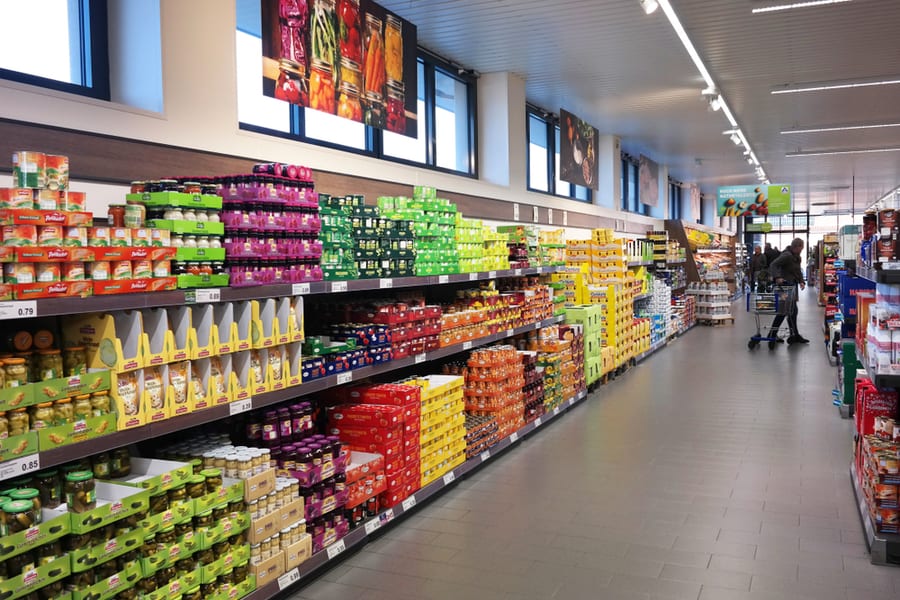 Aisle With Can Food Products, Interior Of An Aldi