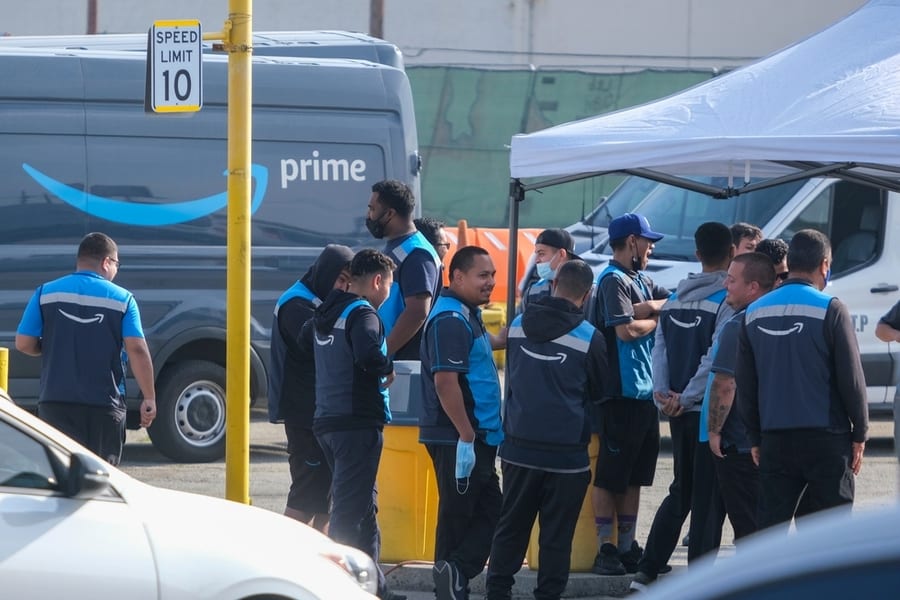 Amazon Drivers And Their Delivery Vans At The Amazon Delivery Station
