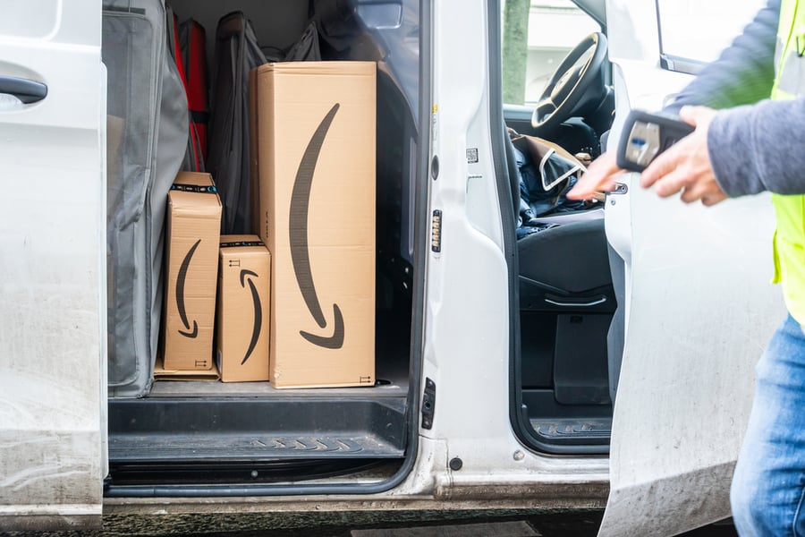 Amazon Prime Cardboard Boxes In A White Delivery Van