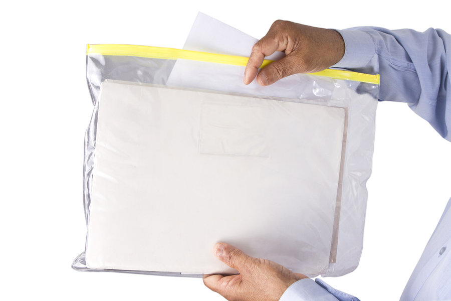 Man Keeping Documents Safely In A Transparent Plastic Zipper Bag
