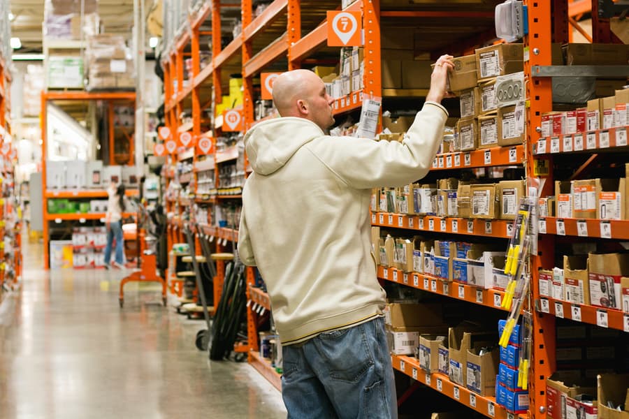 Man Shopping For Electrical Supplies At The Local Home Depot Retail Home Improvement Store