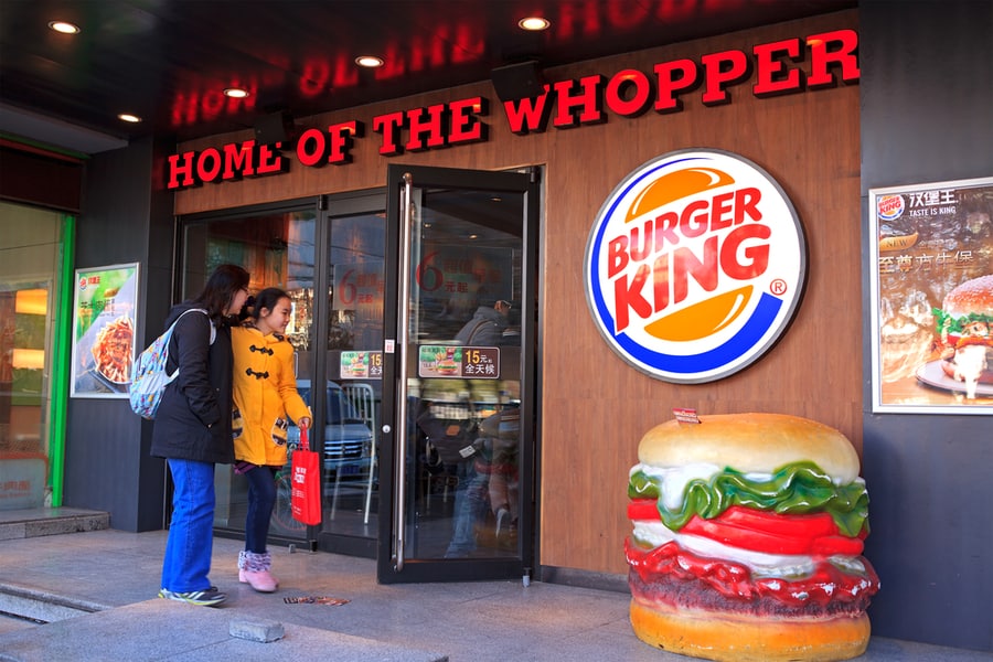 Outside A Burger King Restaurant. Burger King Claims To Serve More Than 11 Million Guests Per Day In 91 Countries And Territories Around The World.