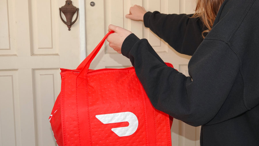 Person Making A Doordash Food Delivery