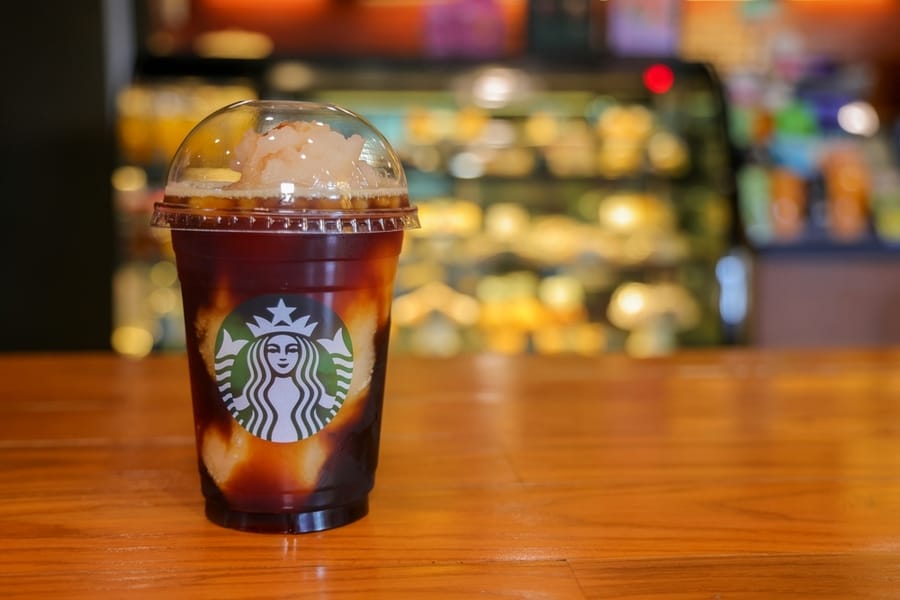 Starbuck Honey Ruby Grapefruit Cold Brew With Blurred Background